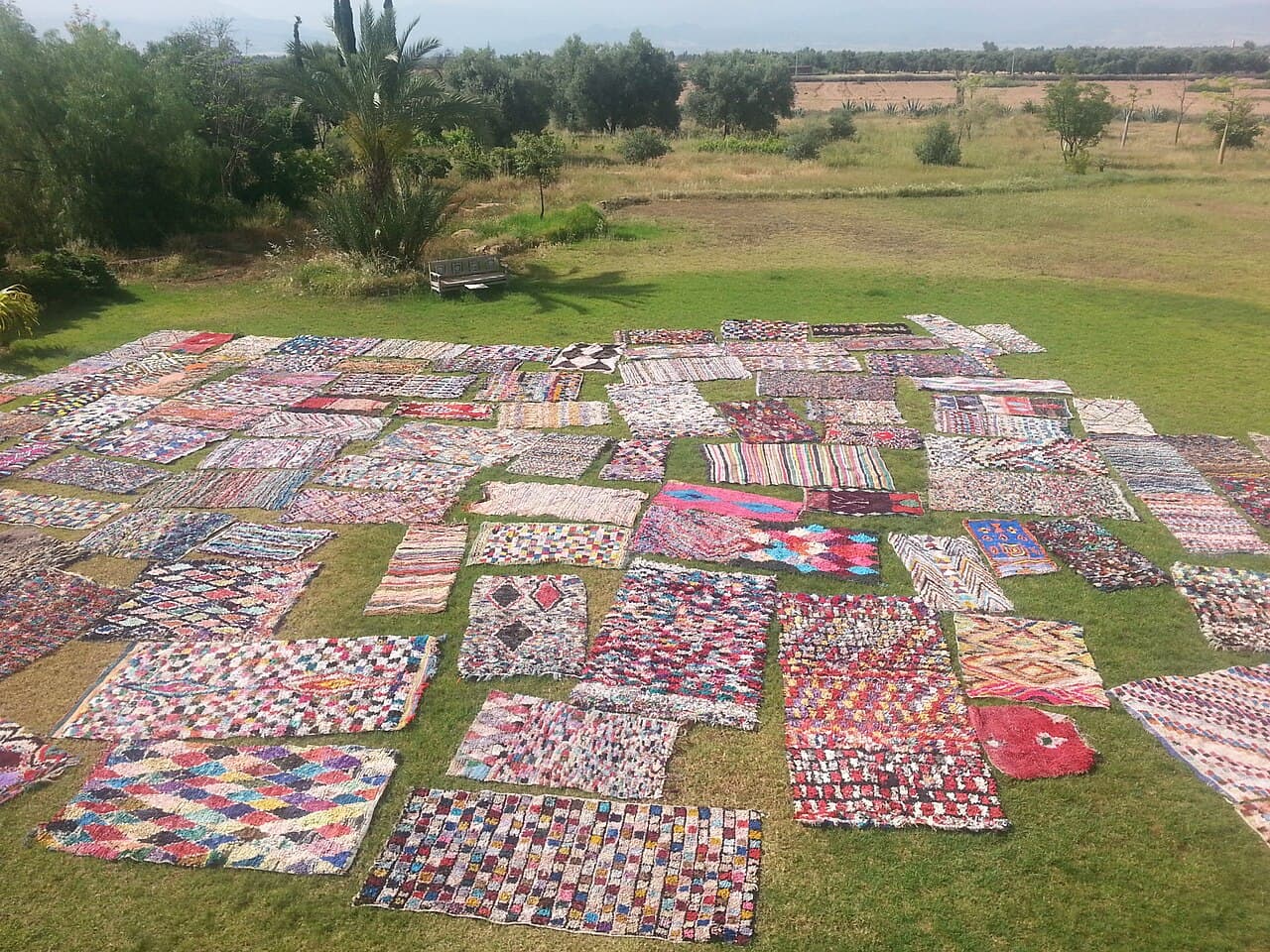 Moroccan Berber rugs stacked in a market